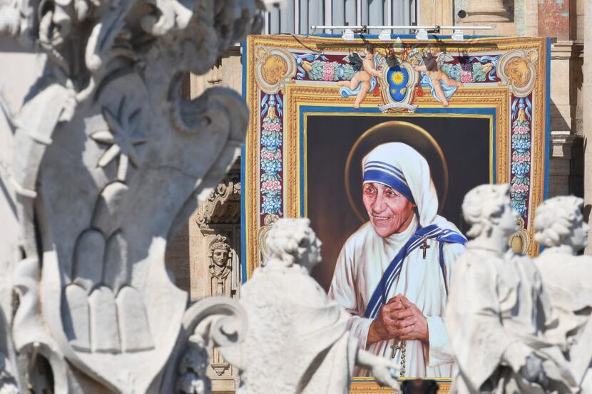 A tapestry depicting Mother Teresa is seen on the facade of the Vatican building, during the...