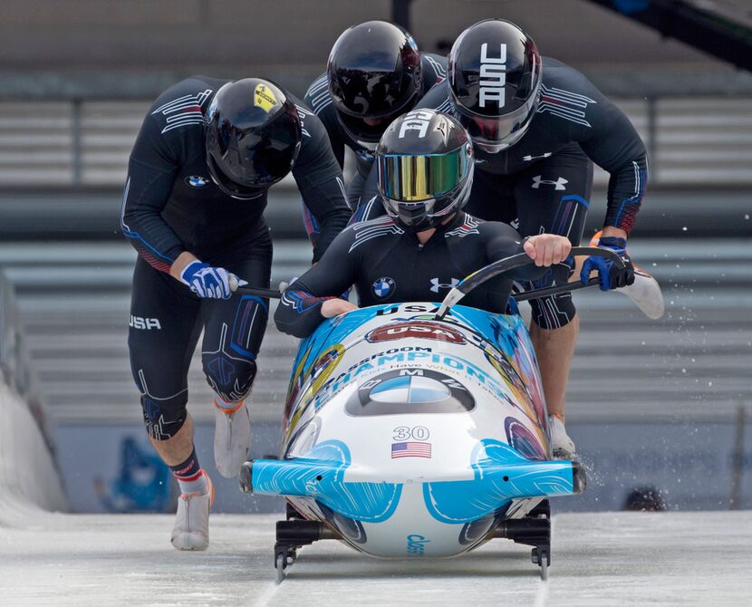 FILE - In this March 7, 2015, file photo, driver Codie Bascue, front, and his United States...