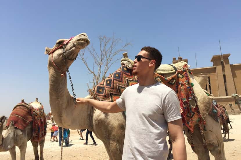 Dallas Mavericks forward Dwight Powell rode camels and slept in the desert during his summer...