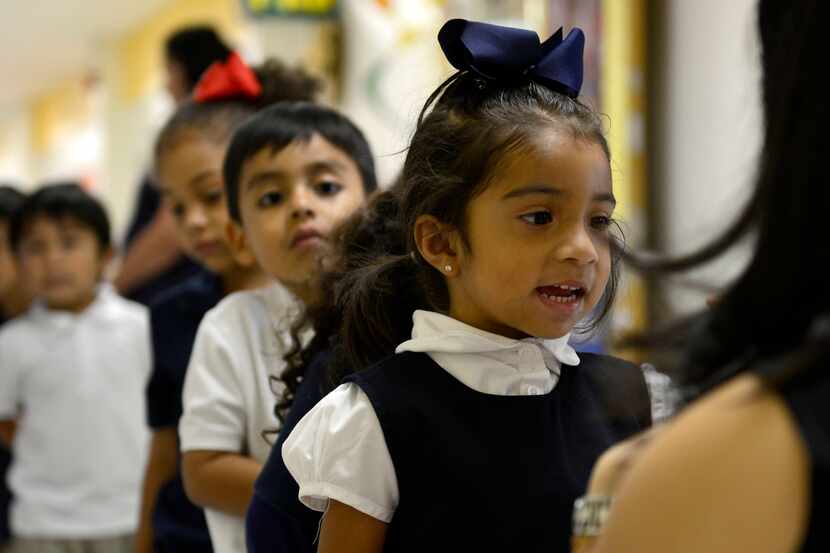 Pre-kindergartners take part in activities at Arthur Kramer Elementary School in Dallas....