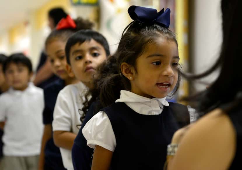 Pre-kindergartners take part in activities at Arthur Kramer Elementary School in Dallas....