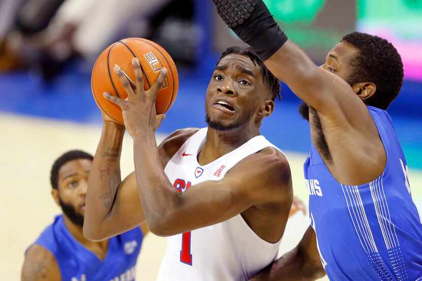 Southern Methodist Mustangs guard Shake Milton (1) puts up a driving shot past New Orleans...