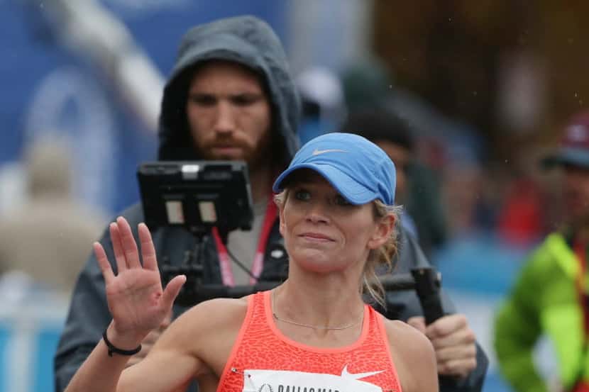 Dawn Grunnagle won the half marathon during the 45th running of the Dallas Marathon in...