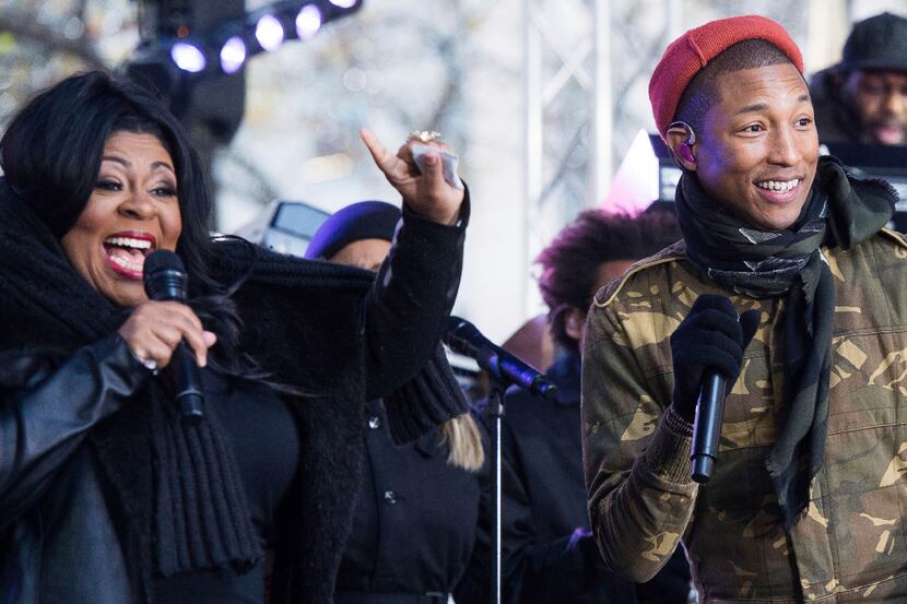 Kim Burrell and Pharrell Williams perform on NBC's "Today" show at Rockefeller Plaza on...