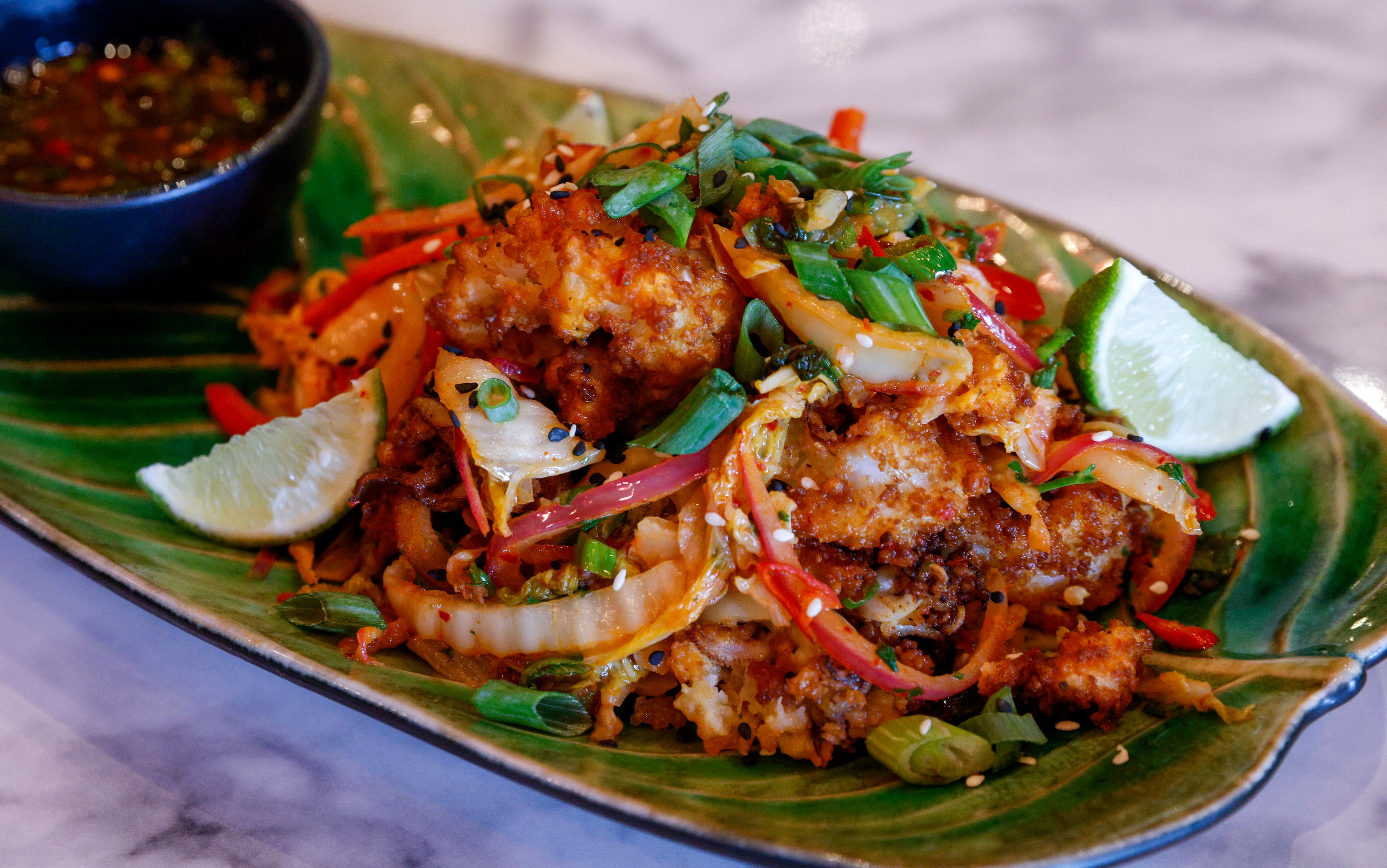 Kimchi calamari pictured at Snowbird, Thursday, Oct. 6, 2022 in Frisco, Texas.