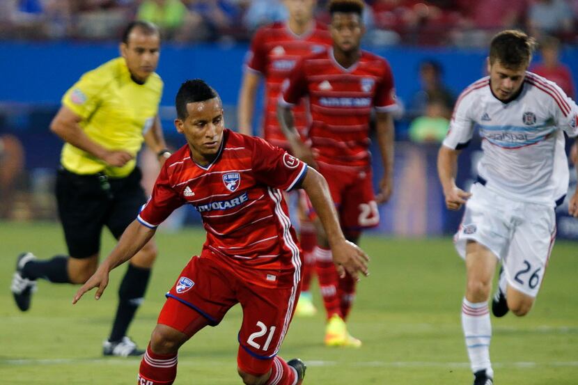 FC Dallas midfielder Michael Barrios (21) breaks away during the first half as FC Dallas...