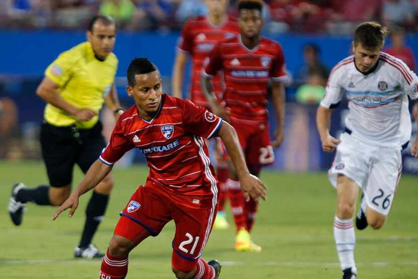 FC Dallas midfielder Michael Barrios (21) breaks away during the first half as FC Dallas...