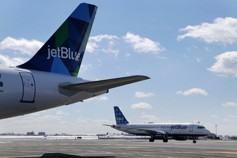 Jet Blue airplanes on the tarmac at John F. Kennedy International Airport in New York,...