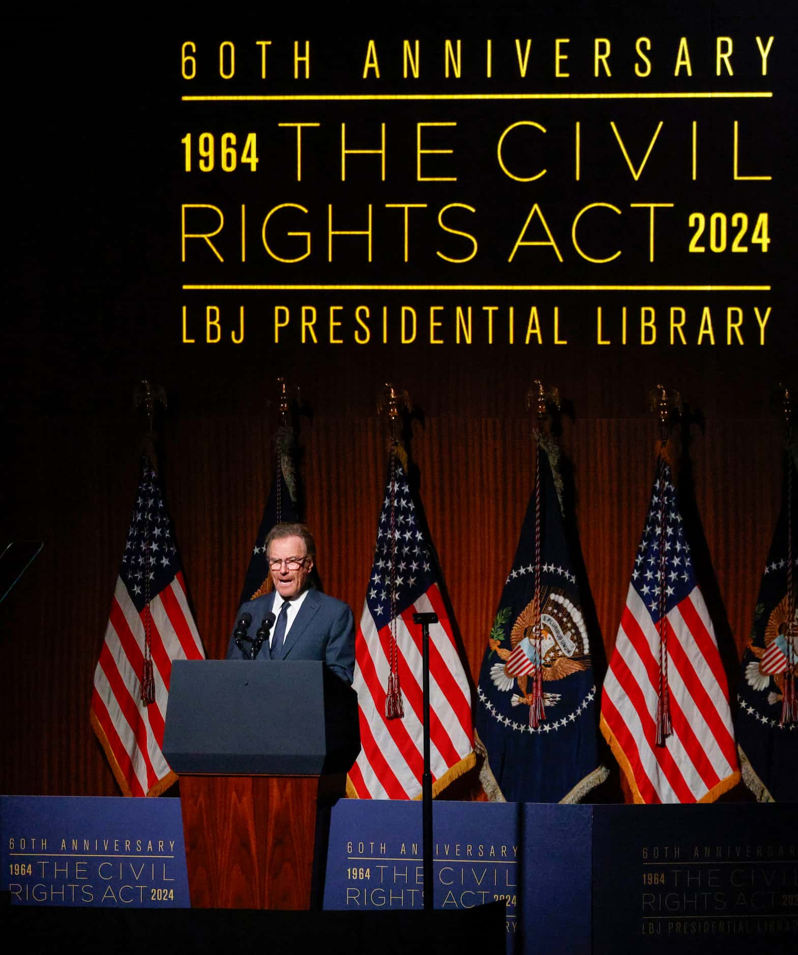 Actor Bryan Cranston reads an excerpt of the Civil Rights Act during an event commemorating...