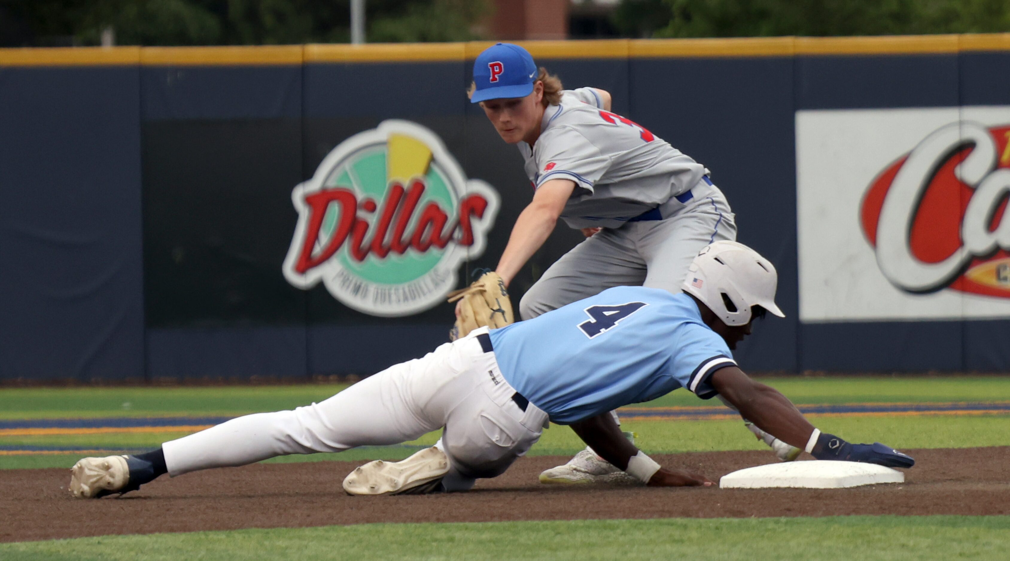 Prestonwood outfielder Lash Henderson (4) slides safely into 2nd base as Parish Episcopal...