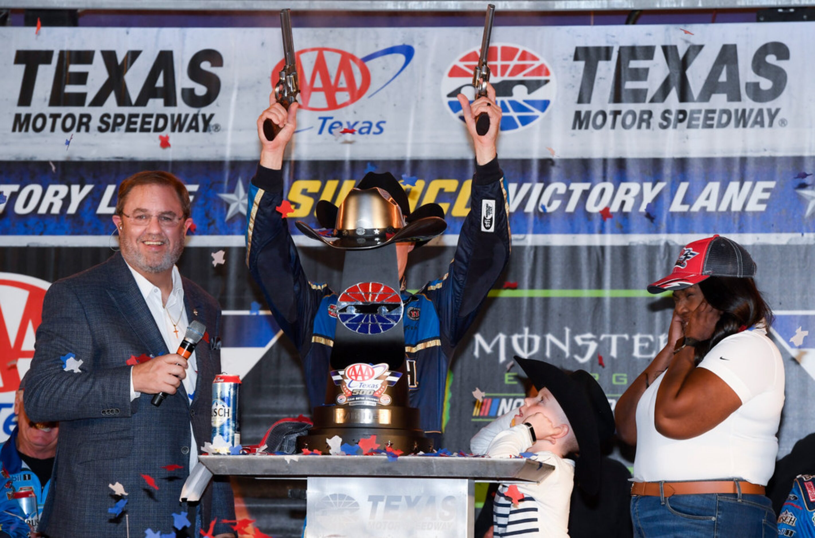 Kevin Harvick, obscured, celebrates in Victory Lane after winning a NASCAR Cup Series auto...