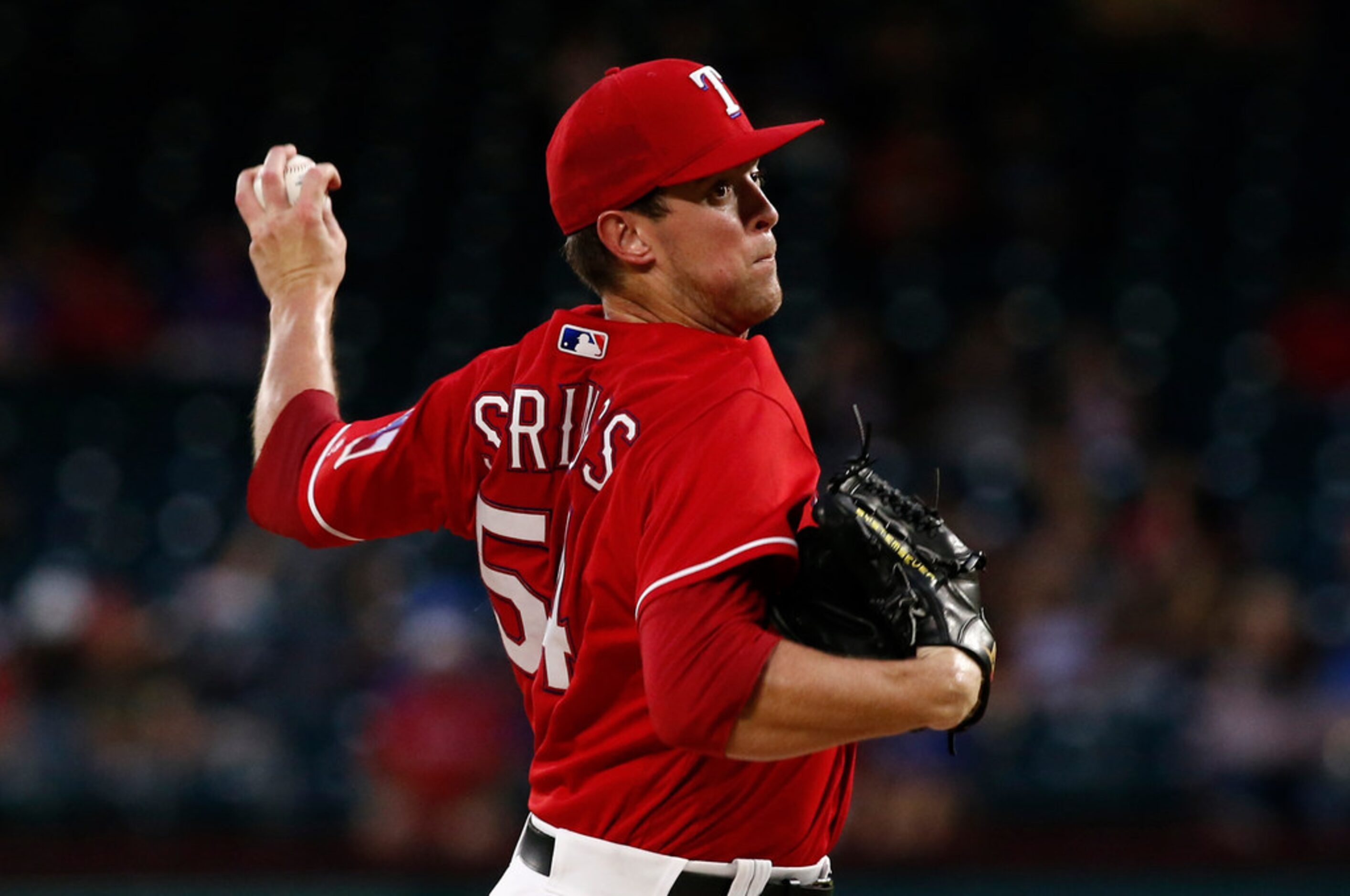 Texas Rangers starting pitcher Jeffrey Springs delivers against the Los Angeles Angels...