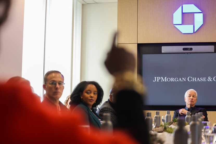 JPMorgan Chase CEO Jamie Dimon (right) visits a branch in Oak Cliff Dallas.