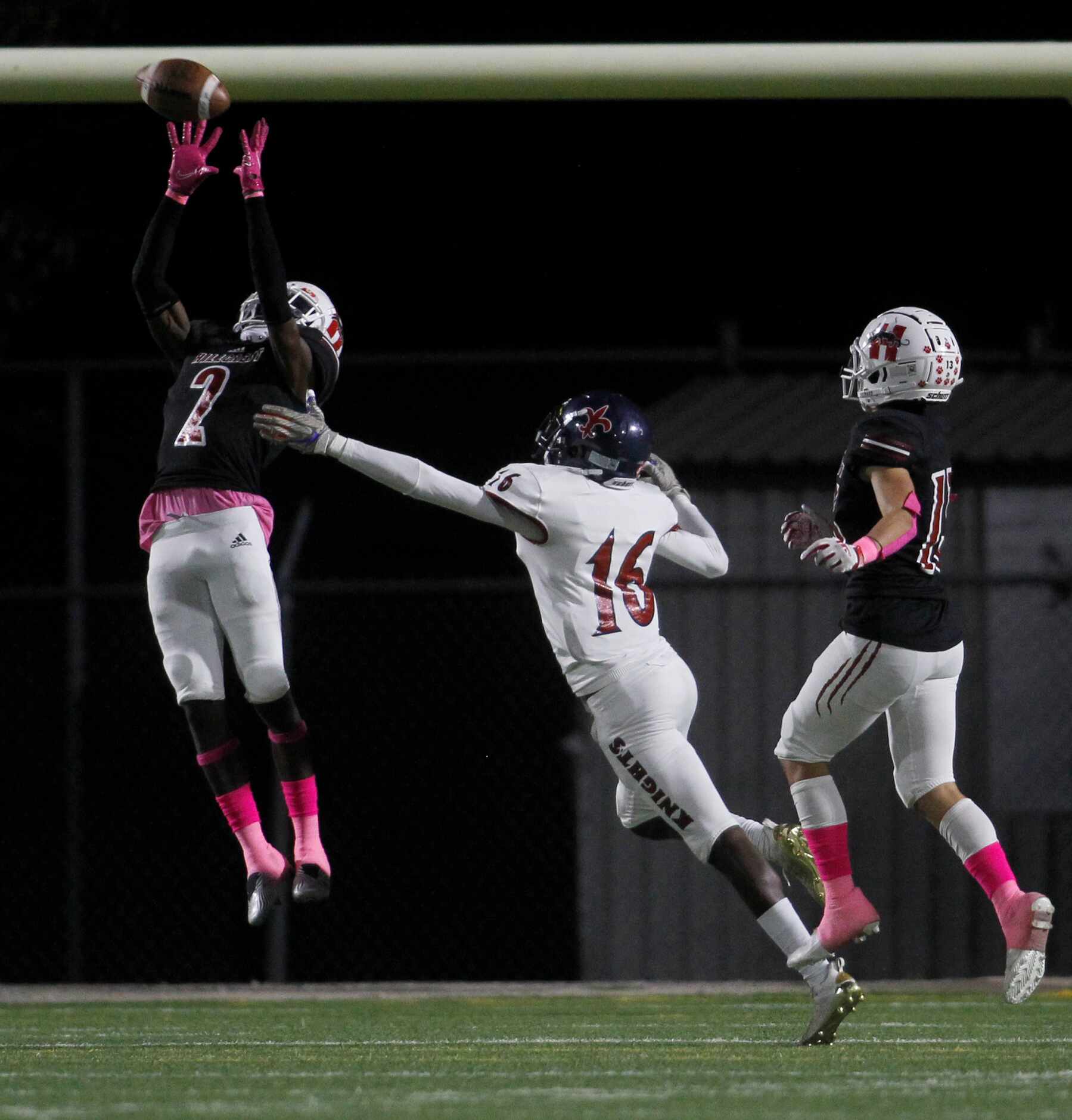 Dallas Hillcrest defensive back Reggie Williams (2) leaps and narrowly missed making an...