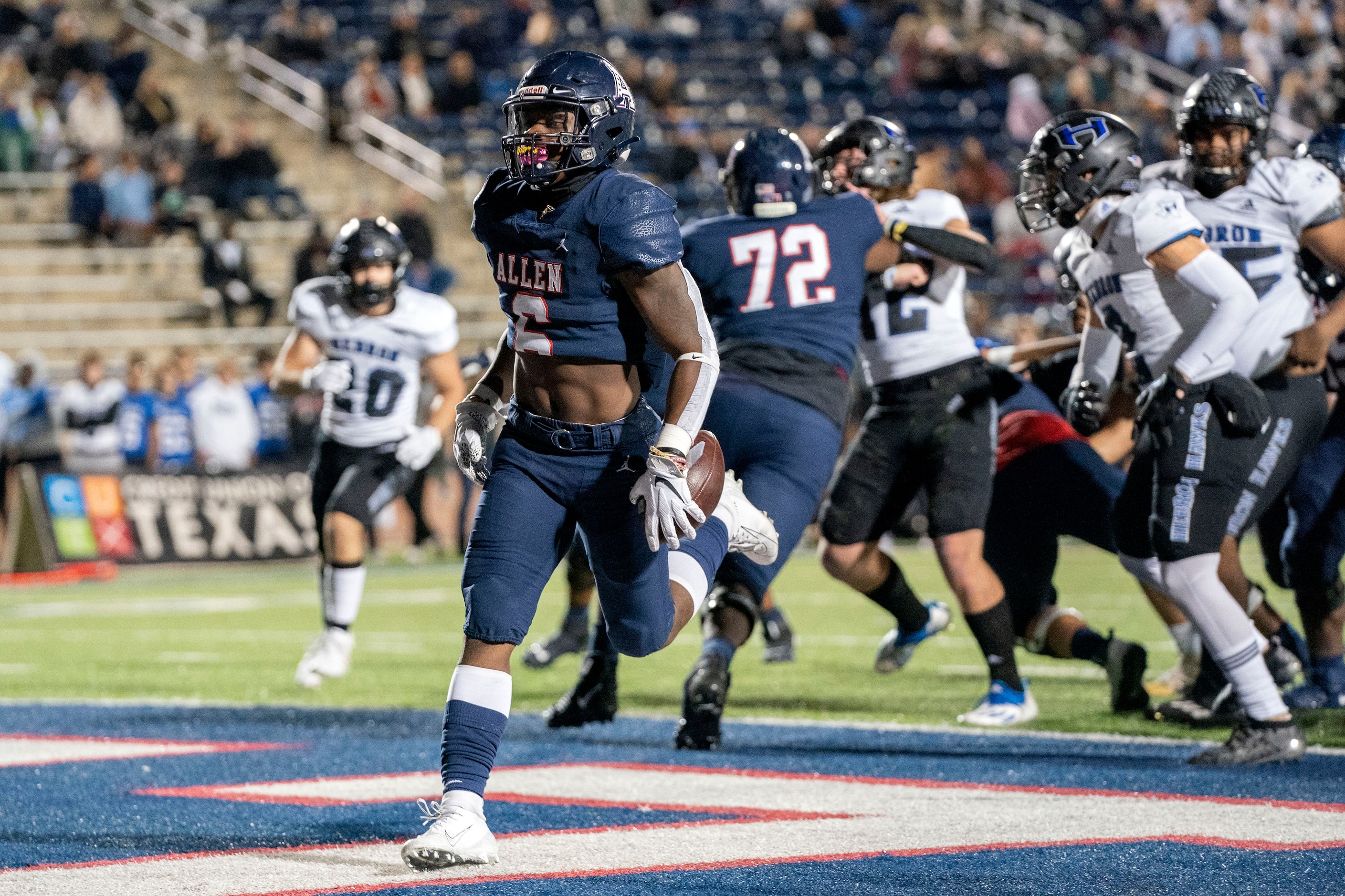 Allen junior running back Devyn D. Turner (6) rushes for a touchdown against Hebron during...