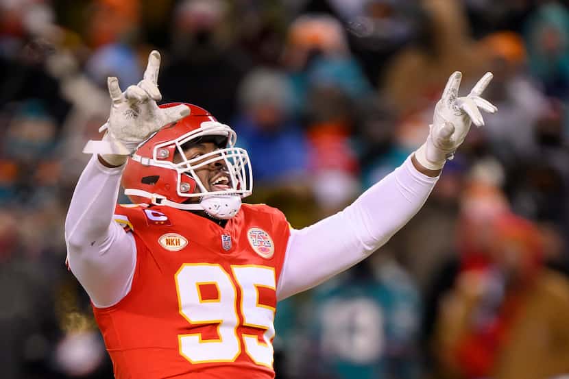 FILE - Kansas City Chiefs defensive tackle Chris Jones celebrates a sack against the Miami...