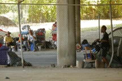  More than 200 people live in Tent City under Interstate 45 just south of downtown Dallas....