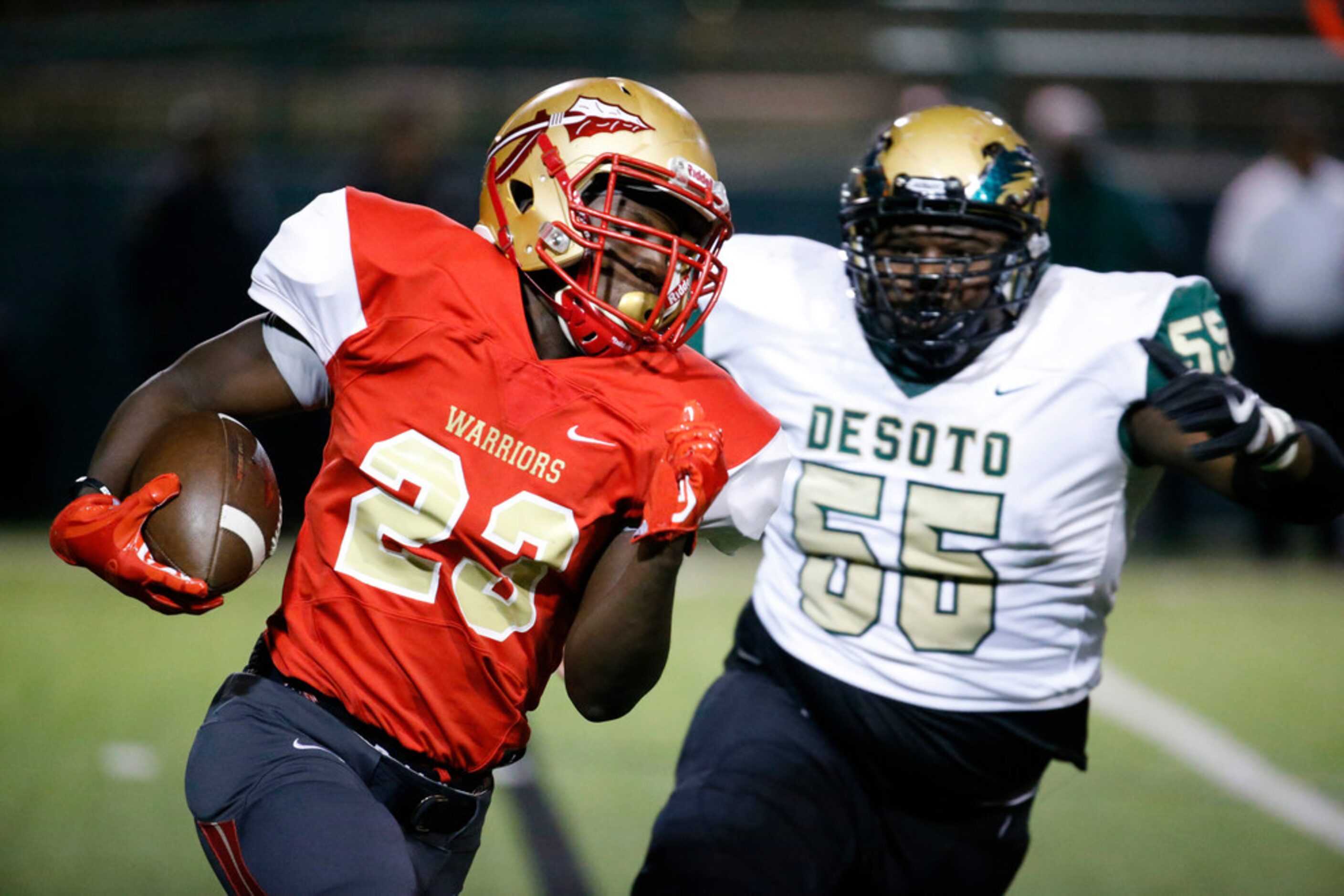 South Grand Prairie's Javarius Crawford (23) is chased by Desoto's Viramontes Pippens-Redic...