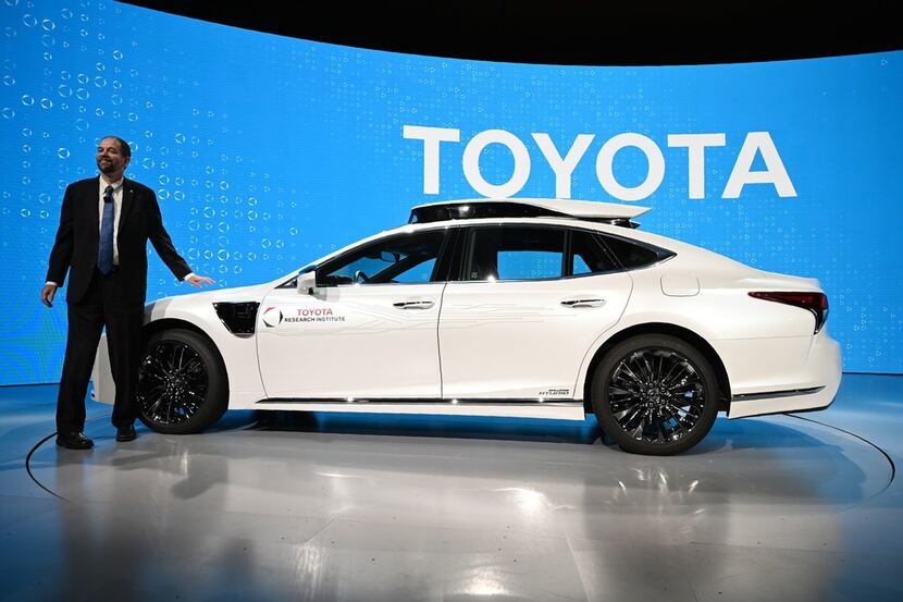 Gill Pratt, CEO Toyota Research Institute, unveils a new semi-autonomous P4 prototype based...