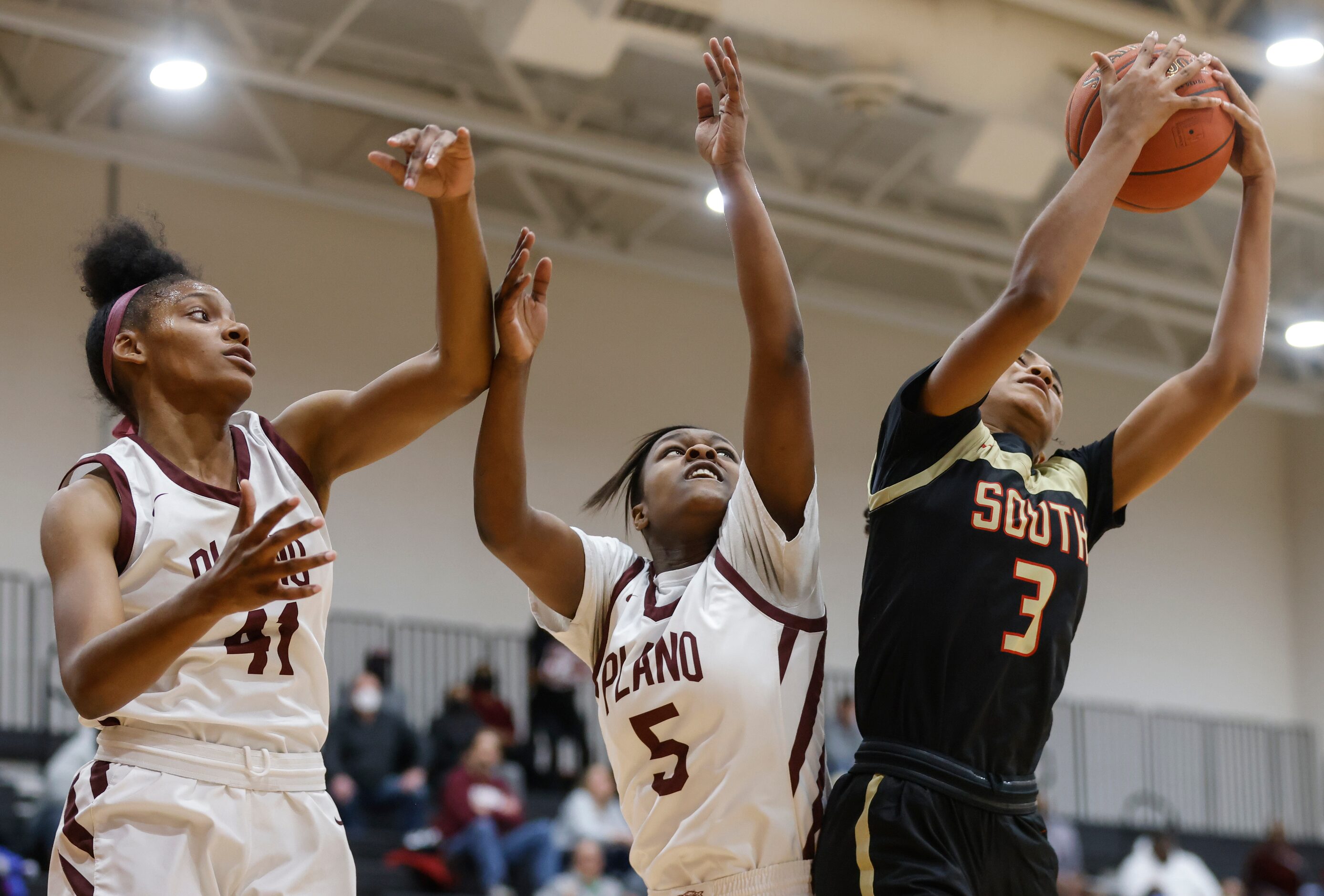 Plano Senior High School Allysa Pendley (41) and Plano Senior High School Zen Nuako (5)...