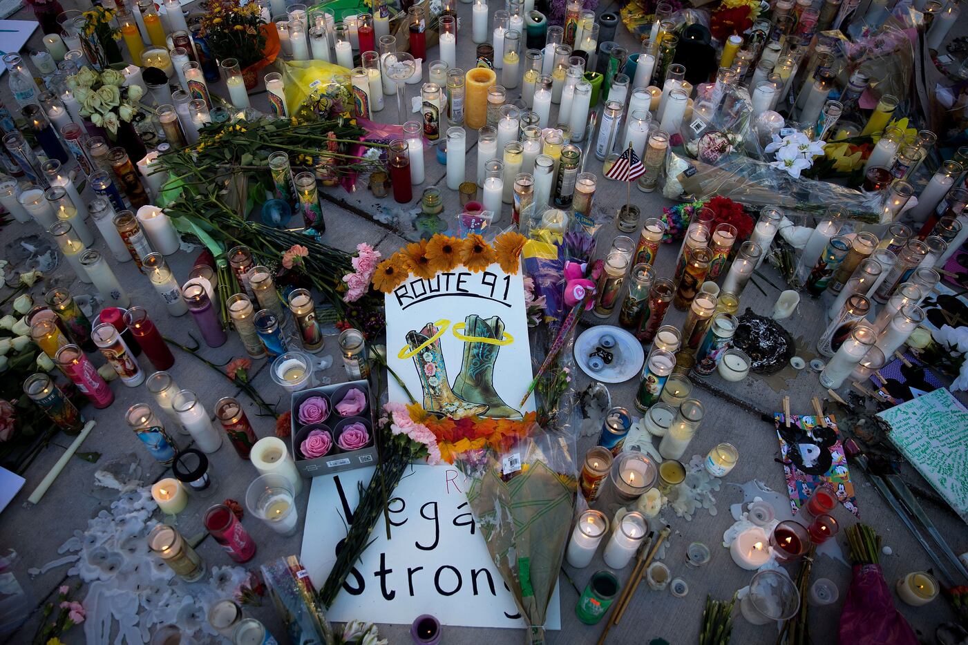 A makeshift memorial for the victims of Sunday night's mass shooting stands at an...