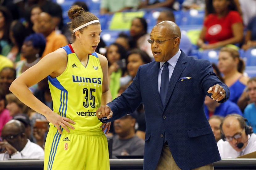 Dallas Wings head coach Fred Williams gives instruction to forward Jordan Hooper (35) in the...