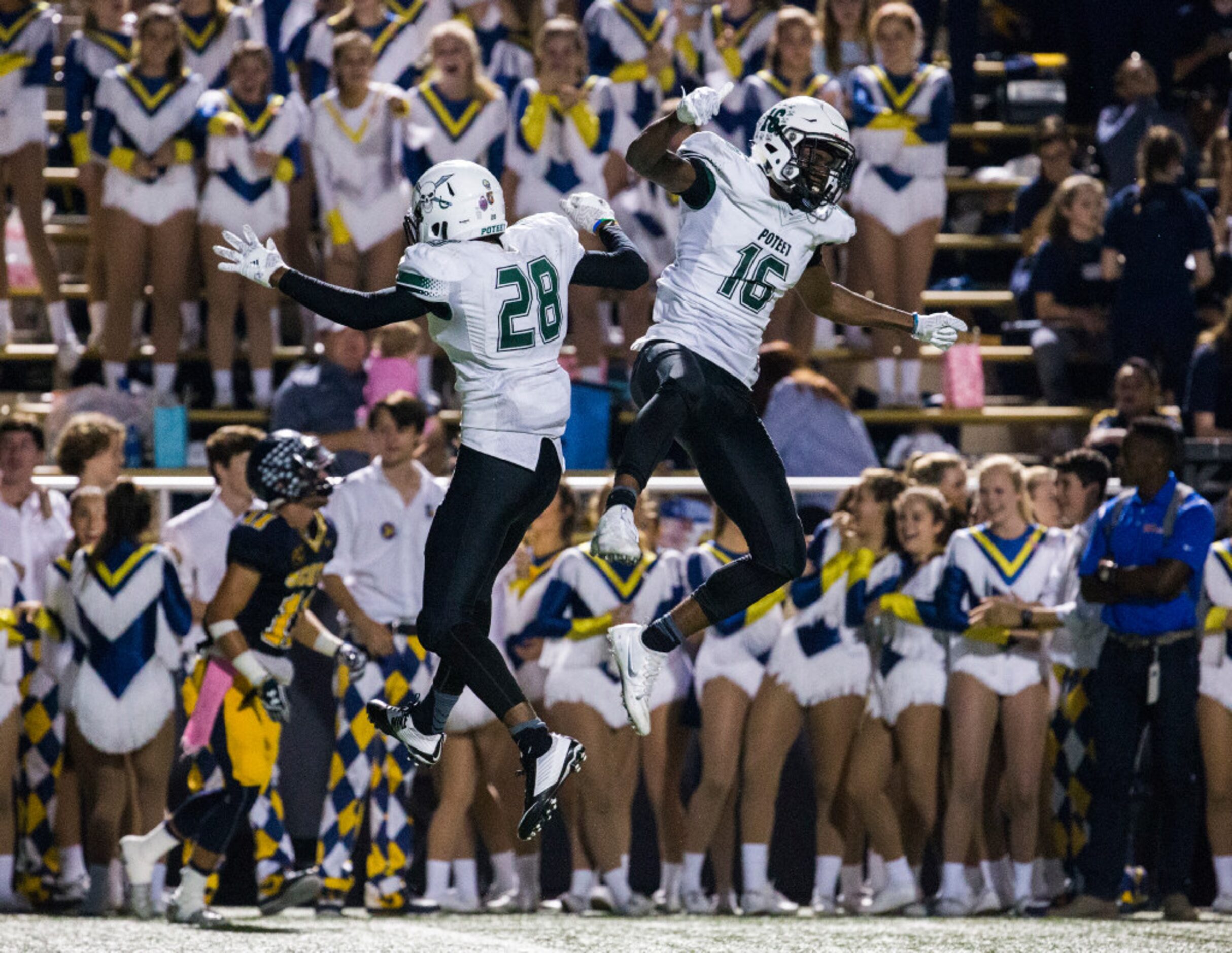 Mesquite Poteet defensive back Mekhi Garner (28) and defensive back Jimmy Phillips, Jr. (16)...