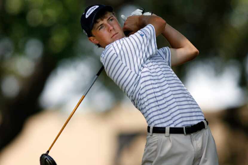 Fourteen year old Jordan Spieth of Jesuit High School tees off on the tenth hole of the...