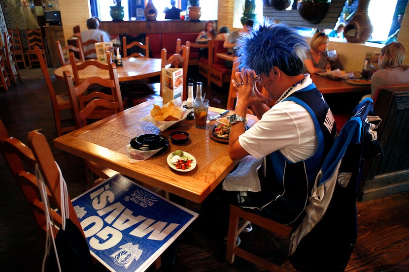 Back in 2011, Dallas Mavericks fan Johnny Romo said a prayer before his lunch at the Knox...