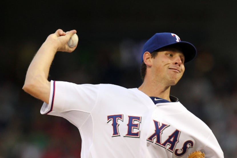 Texas Rangers starting pitcher Nick Tepesch (49) throws against the Tampa Bay Rays  in the...