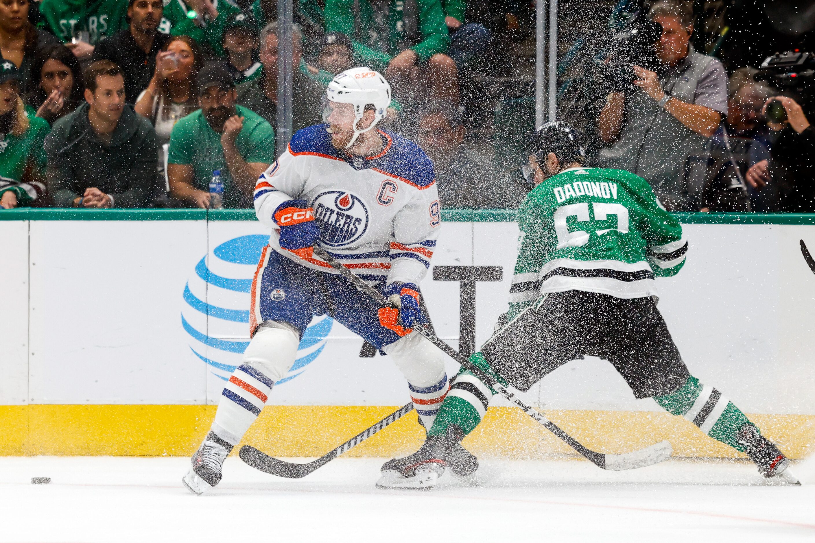 Edmonton Oilers center Connor McDavid (97) stops quickly as Dallas Stars right wing Evgenii...