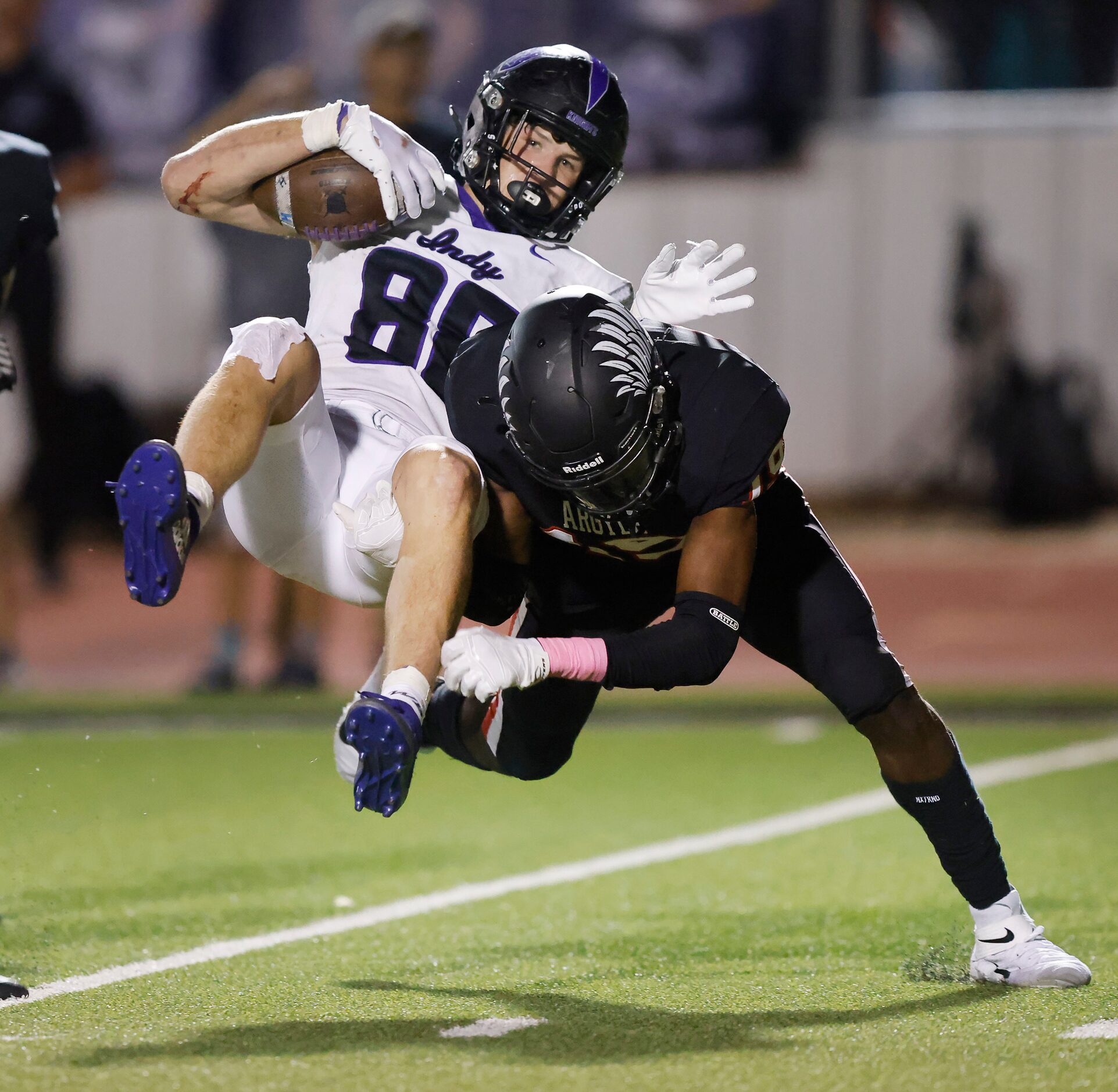 Argyle defensive back Jaaqwan Felton (19) takes out Frisco Independence tight end Jake...