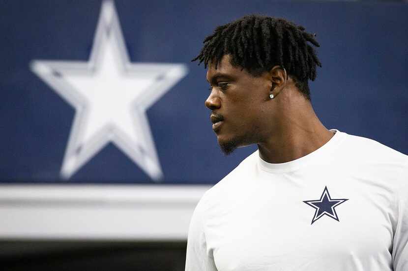 Dallas Cowboys defensive end Randy Gregory warms up before a preseason football game at AT&T...