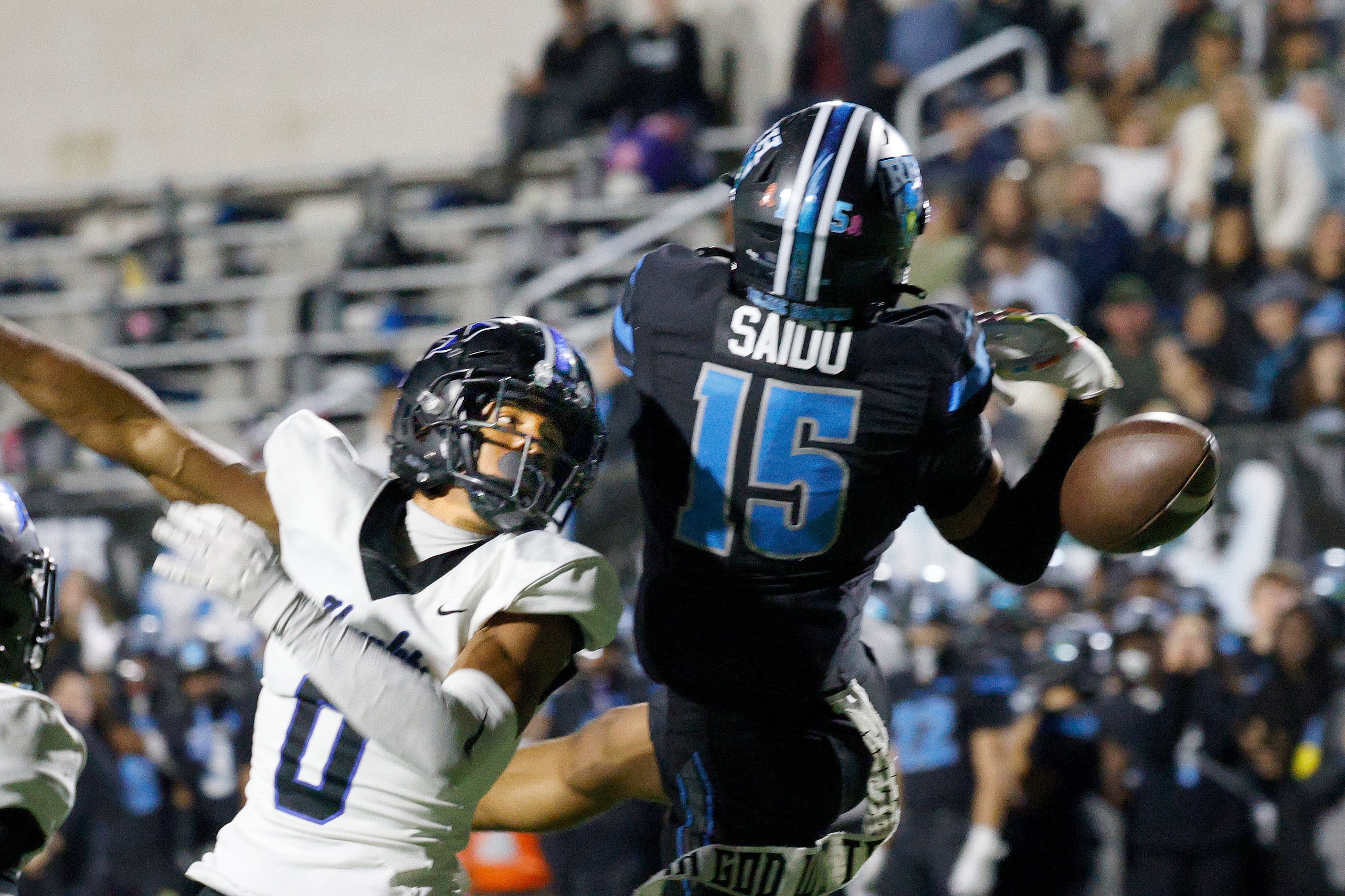 Rock Hill's Dominic Saidu (15) fails to make the catch against Hebron's Gabriel White (0) in...