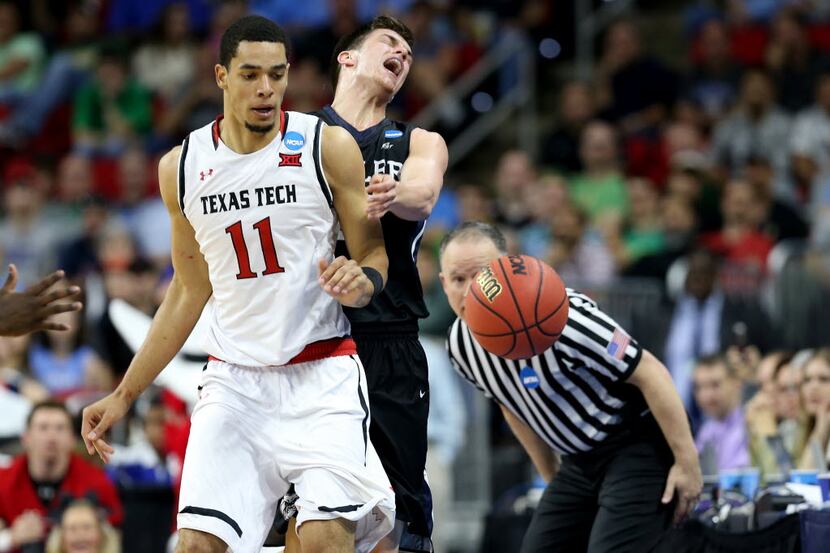RALEIGH, NORTH CAROLINA - MARCH 17:  Zach Smith #11 of the Texas Tech Red Raiders and Kellen...