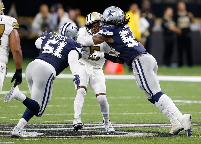 Dallas Cowboys middle linebacker Jaylon Smith (54) sacks New Orleans Saints quarterback...