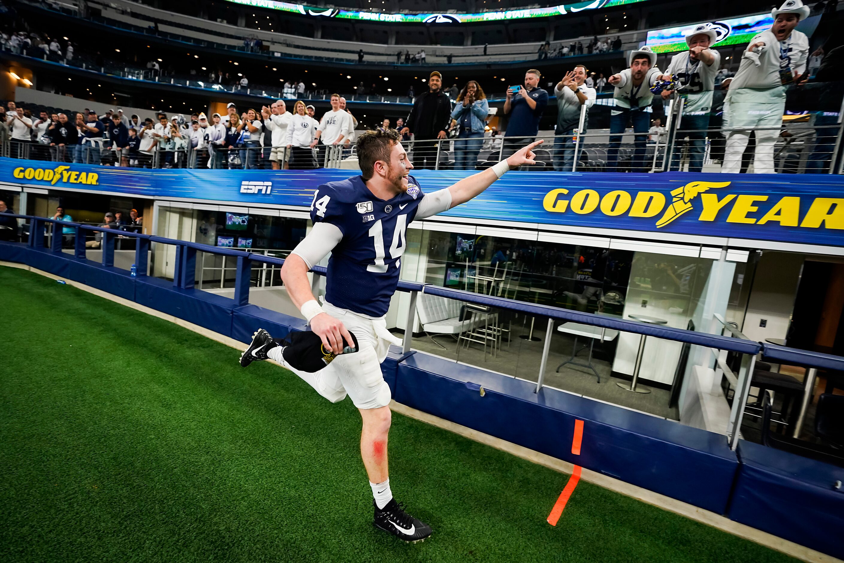 Penn State quarterback Sean Clifford celebrates after the Nittany Lions 53-39 victory over...