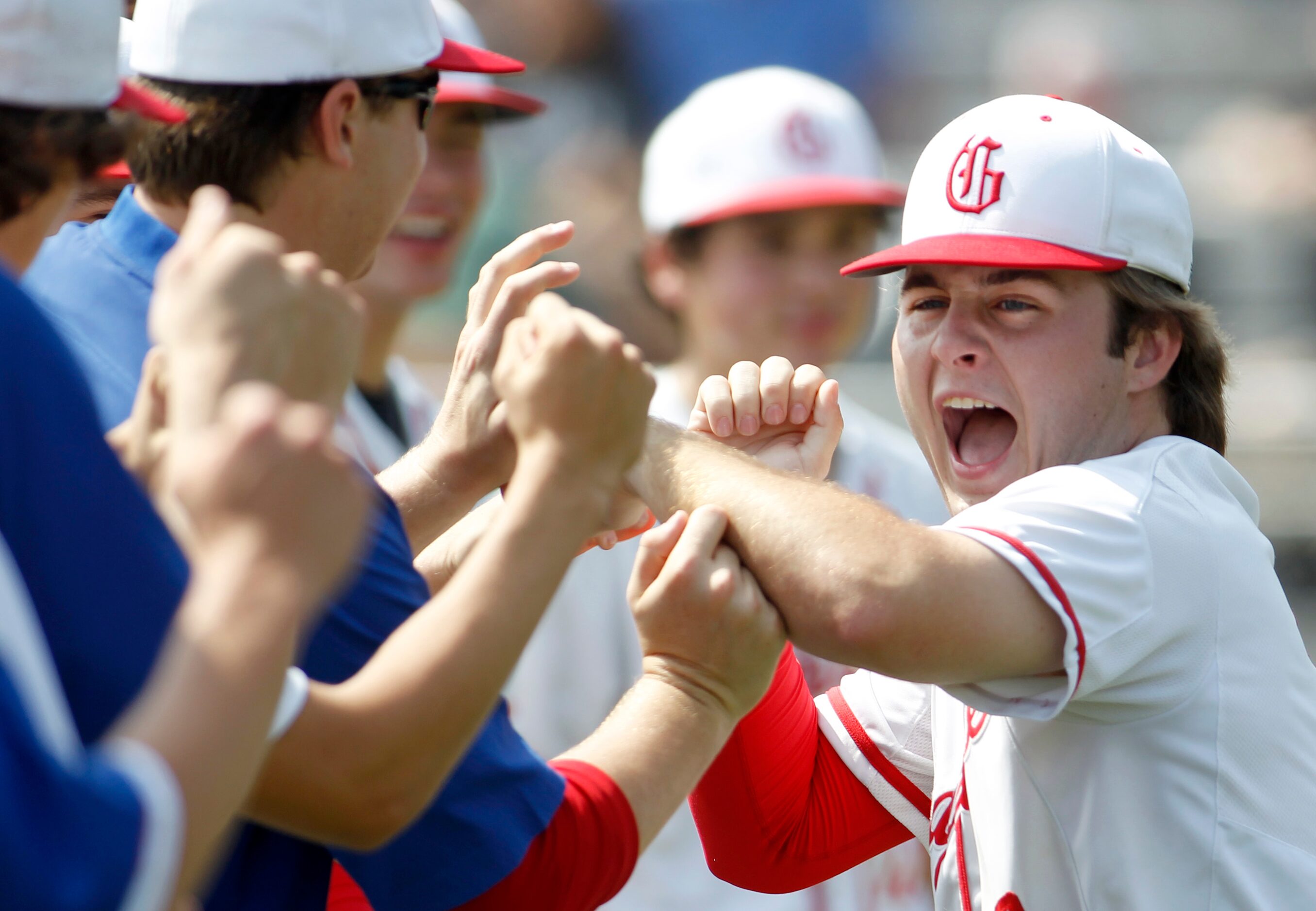 Grapevine's Keller Hamburger (16) lets out a yell during team introductions prior to the...