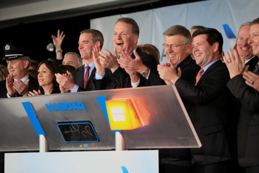 The opening bell rang Dec. 9 for the newly formed American Airlines Group.

