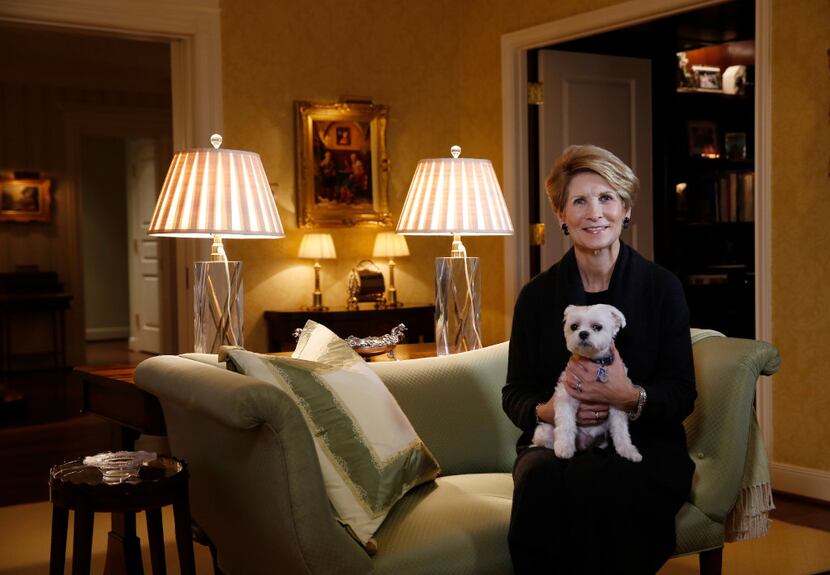 Laura Miller, former Dallas mayor, in her living room with the family dog, Willie.  (David...