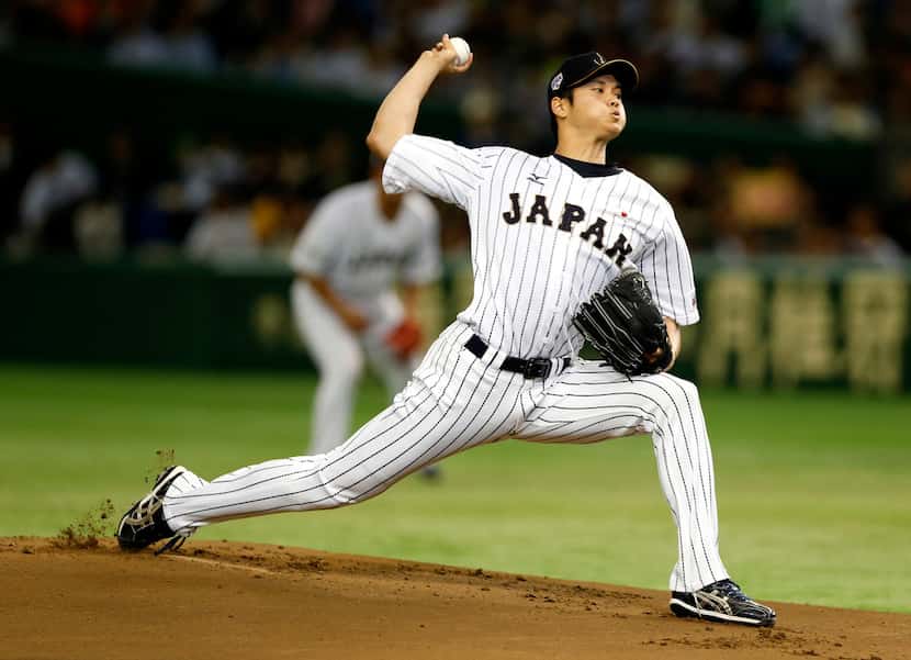 Shohei Ohtani pitches against South Korea in a 2015 Premier12 world baseball tournament...