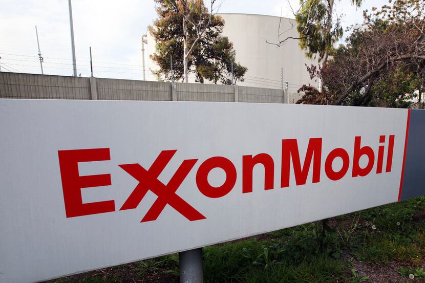FILE - This Jan. 30, 2012, file photo, shows a sign for an Exxon Mobil refinery in...