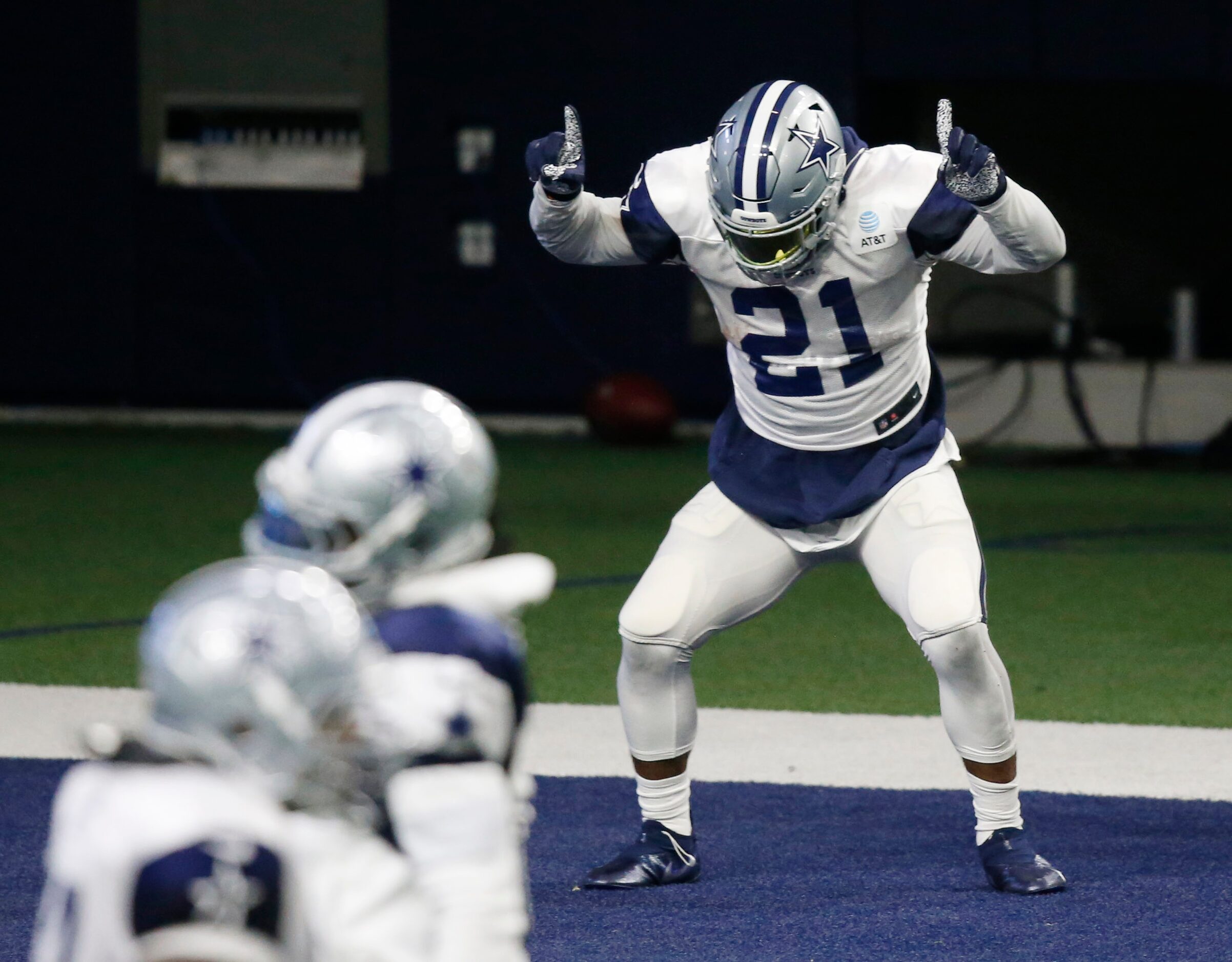 Dallas Cowboys running back Ezekiel Elliott (21) celebrates after scoring a touchdown during...