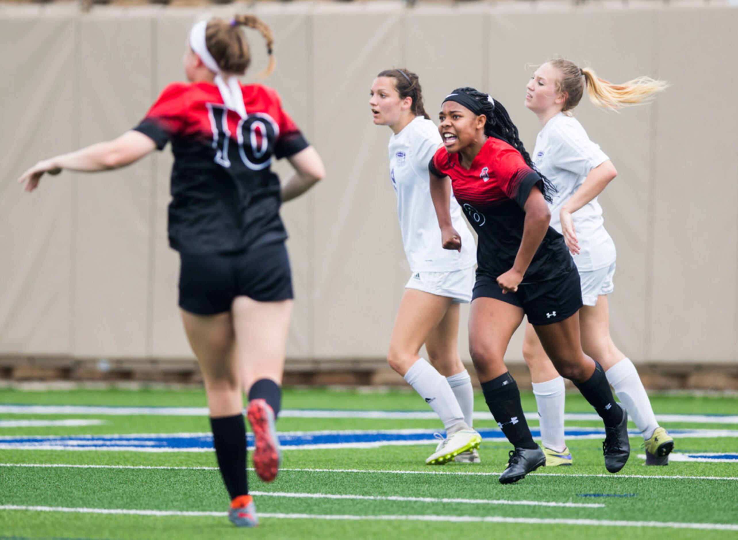 Melissa forward Payton Wallace (8) celebrates scoring a goal during the second half of a UIL...