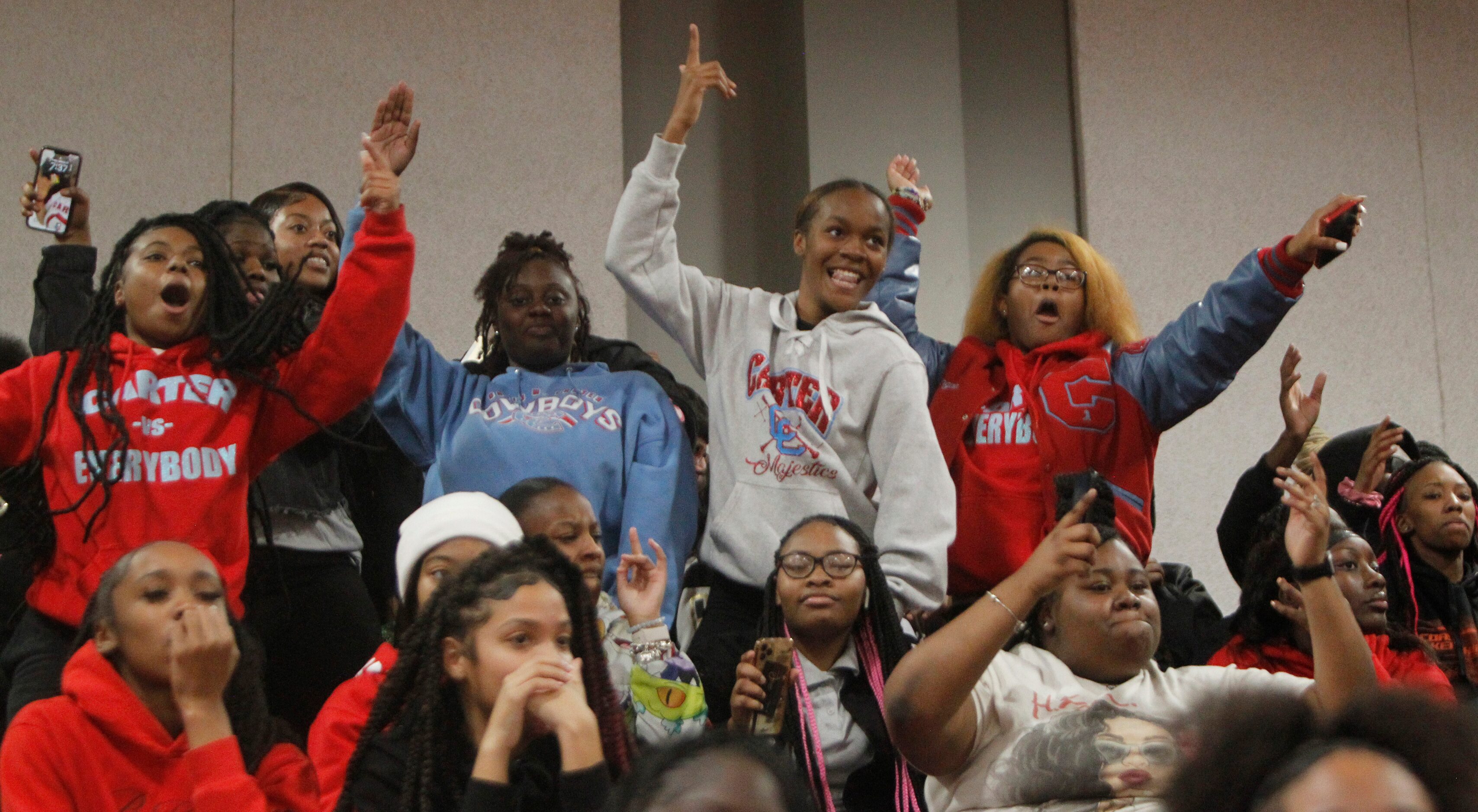 Dallas Carter students show their support before the start of their game against Dallas...