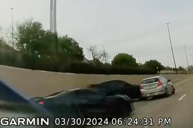 In this screen grab taken from dash camera video provided by Bill Nabors, two speeding...