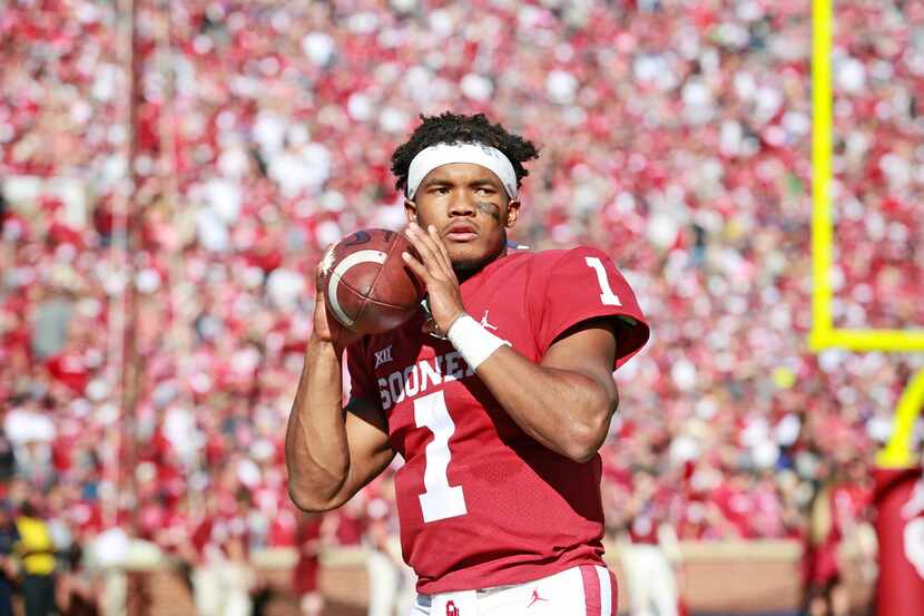 NORMAN, OK - OCTOBER 27: Quarterback Kyler Murray #1 of the Oklahoma Sooners warms up on the...