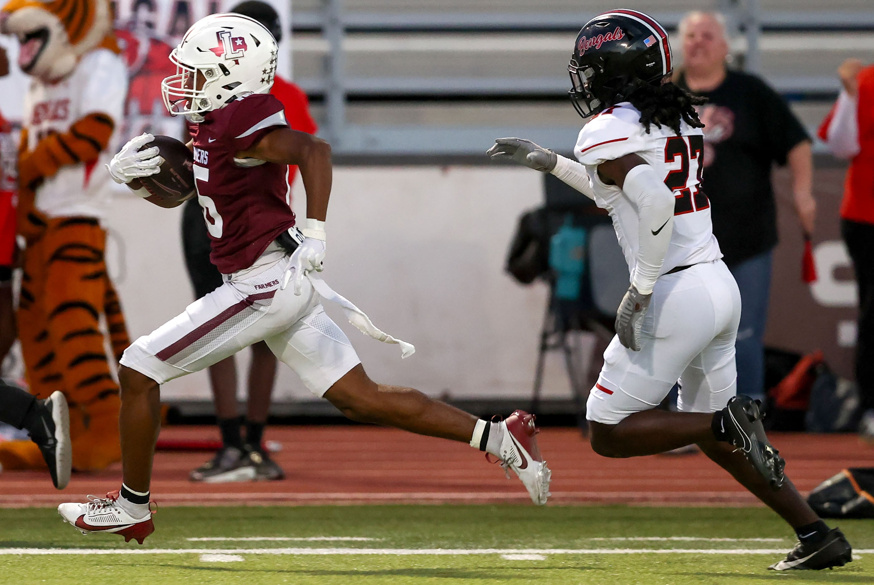 Lewisville wide receiver JT Thomas (16) goes down the sideline for a 73 yard touchdown...