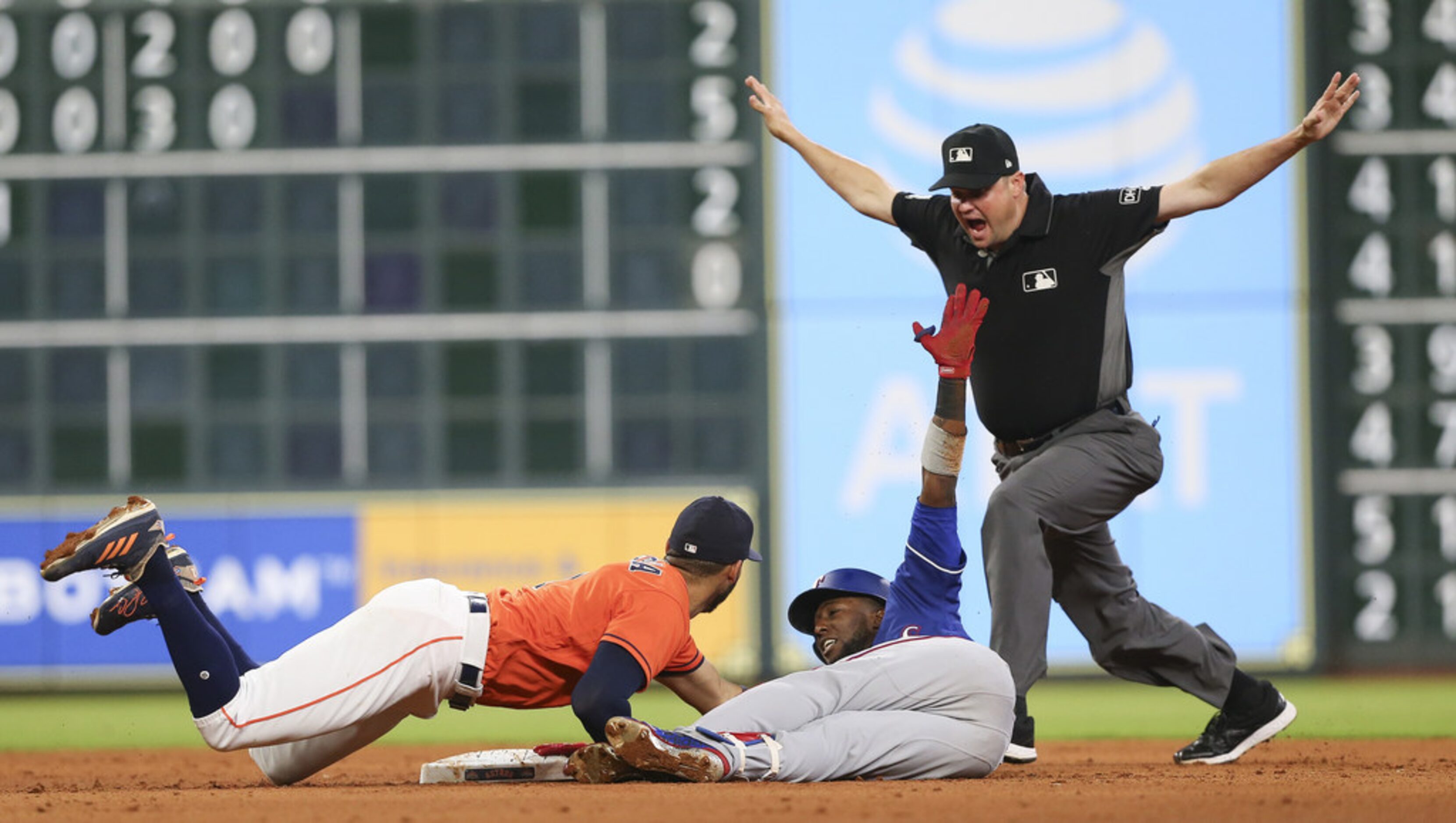 HOUSTON, TX - MAY 11:  Jurickson Profar #19 of the Texas Rangers slides safely into second...