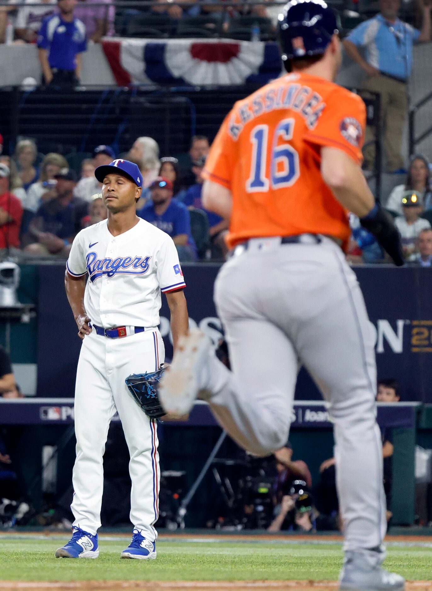 Texas Rangers relief pitcher Jose Leclerc (left) stands in place as Houston Astros Grae...